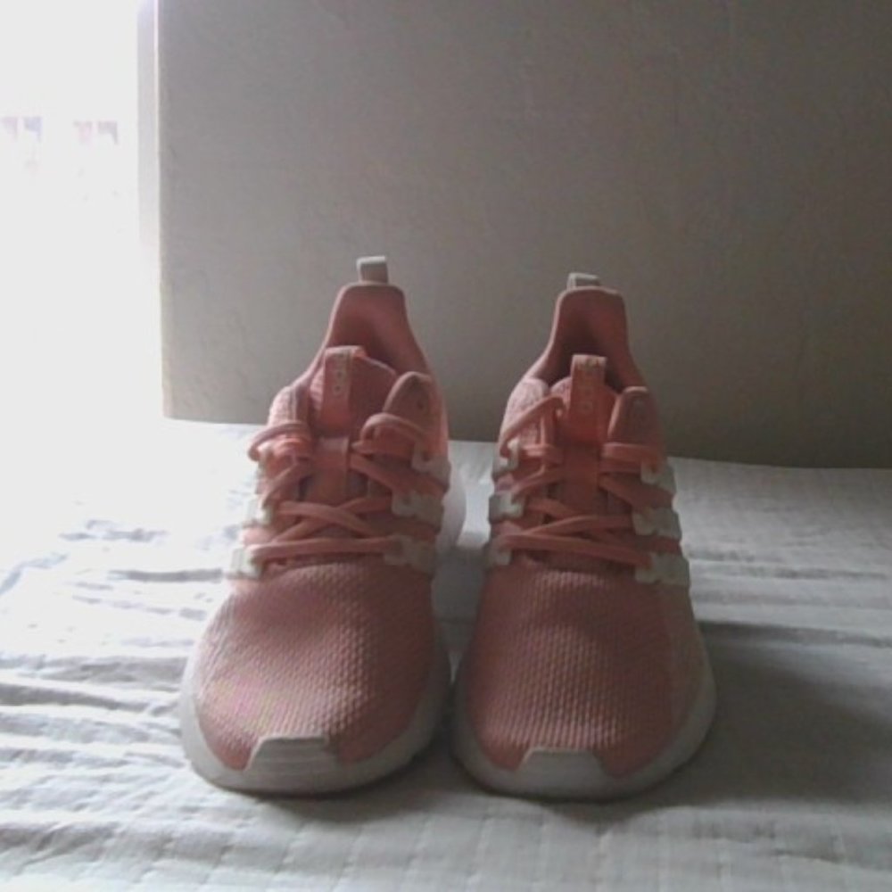 Peach colored Adidas shoes